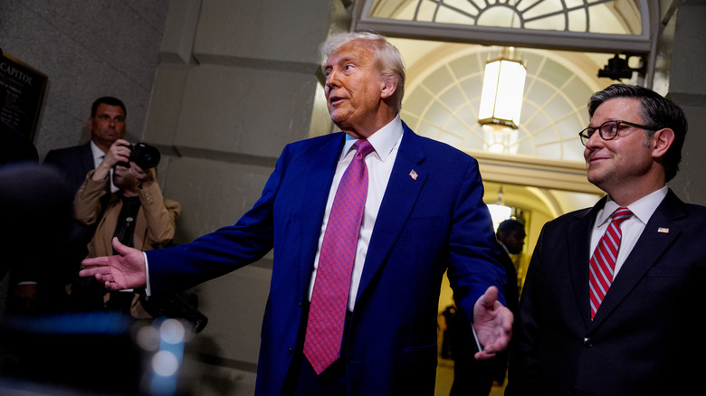 Donald Trump walking to the media