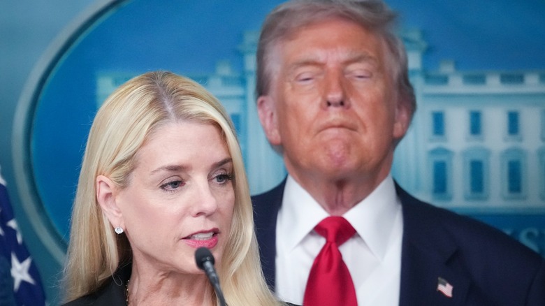 Pam Bondi delivers remarks as Donald Trump looks on in Washington, DC (2025)