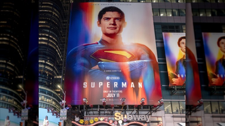 Giant 'Superman' poster hanging on the side of a building
