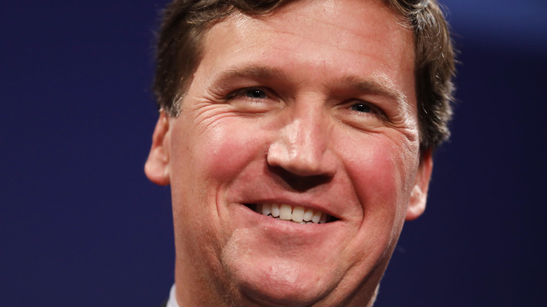 Tucker Carlson smiling 