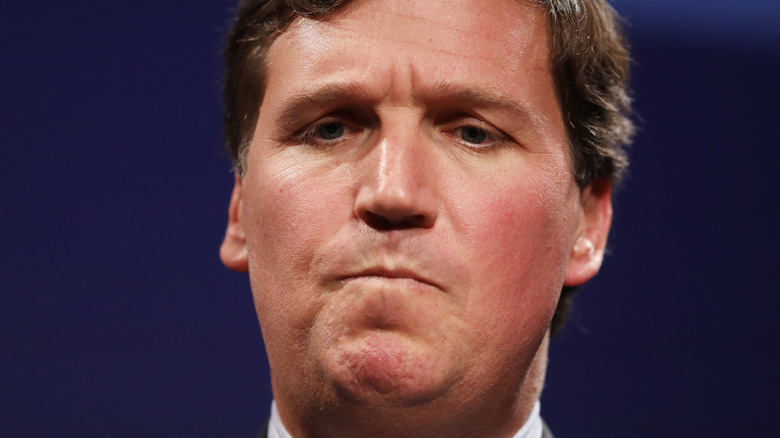 Tucker Carlson frowning 