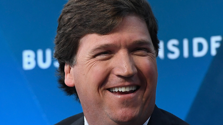 Tucker Carlson smiling