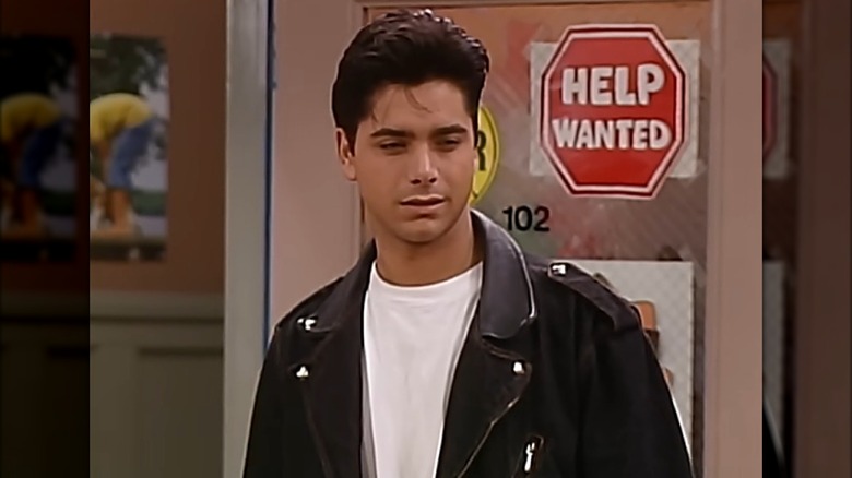 John Stamos as Jesse Katsopolis in a leather jacket on Full House