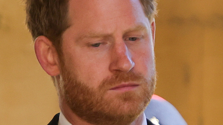 Prince Harry looking somber