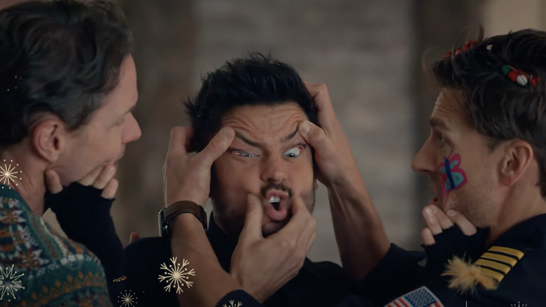 Tyler Hynes getting his face mashed up by co-stars Paul Campbell and Andrew Walker