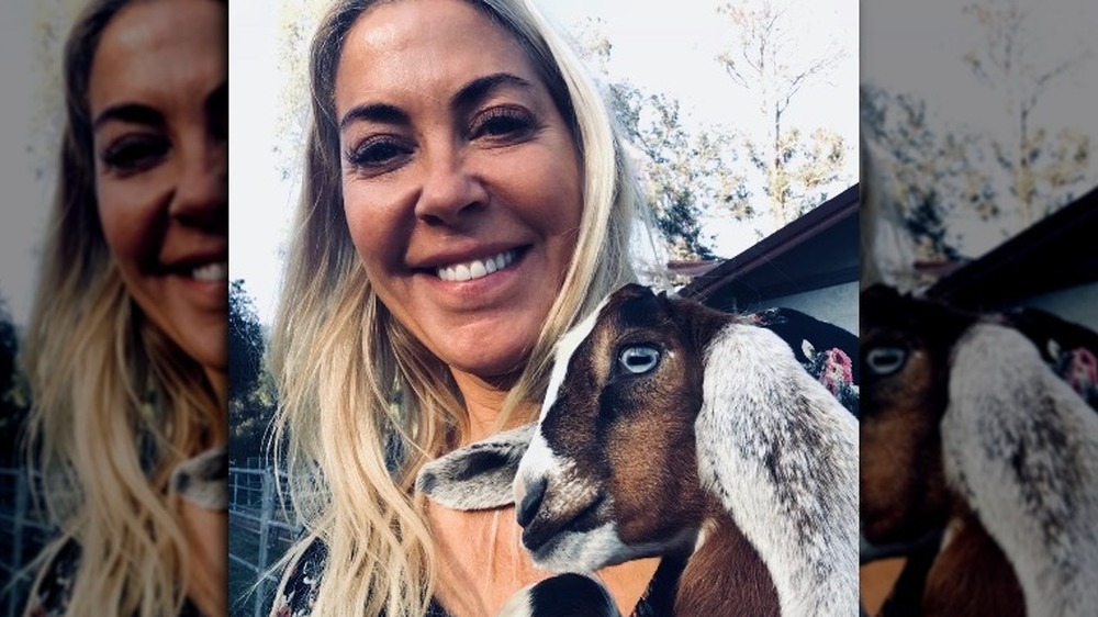 Elaine Culotti with a goat