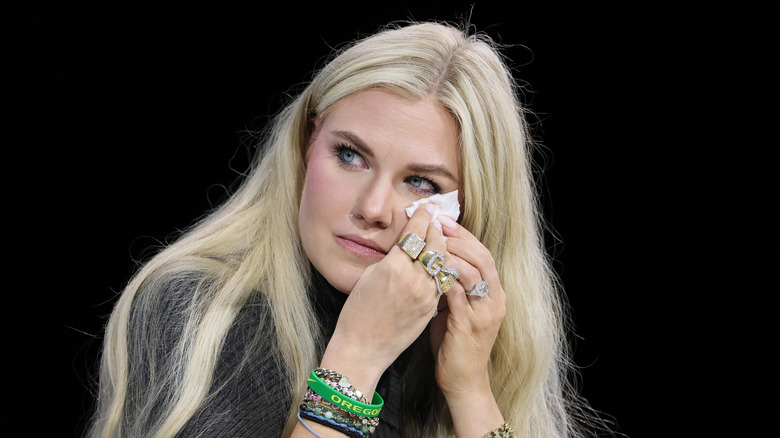 Erika Kirk wiping her eyes