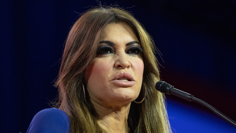 Kimberly Guilfoyle speaking into microphone