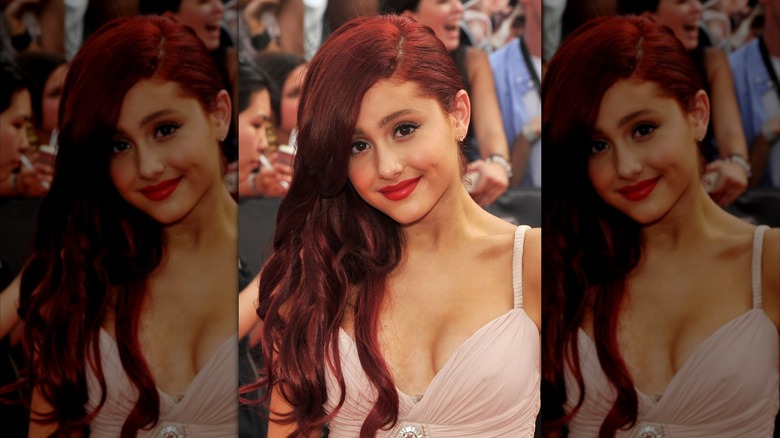 Ariana Grande red lip pale pink dress