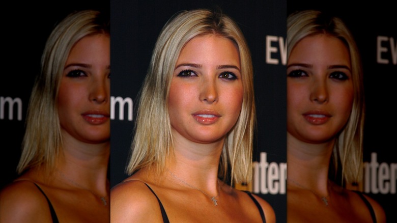 Young Ivanka Trump gazing ahead on a red carpet