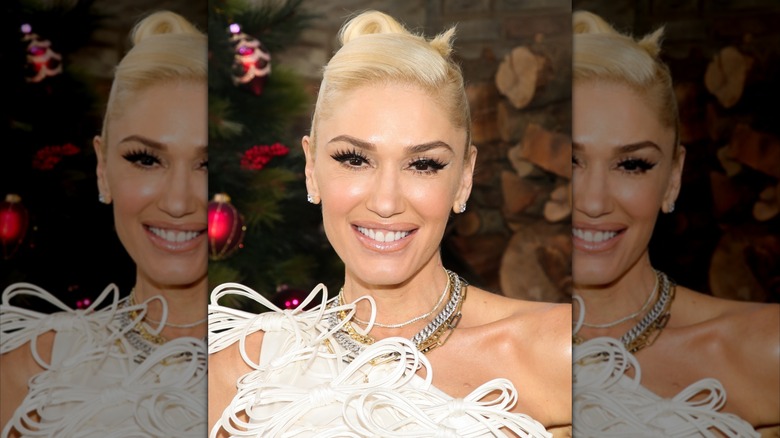 Gwen Stefani close-up white top with bows