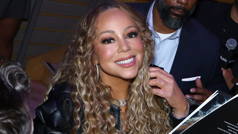 Mariah Carey smiling at an event