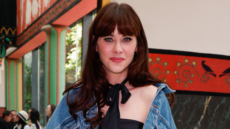 image of Zooey Deschanel smiling at an event