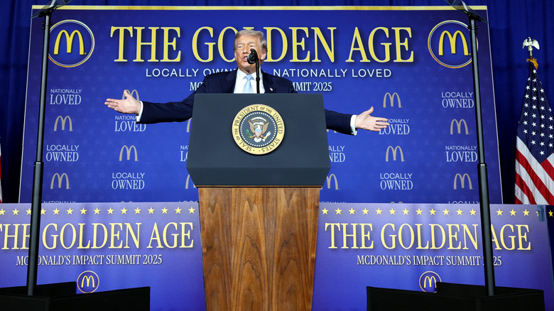 Donald Trump arms spread speaking at McDonald's Impact Summit