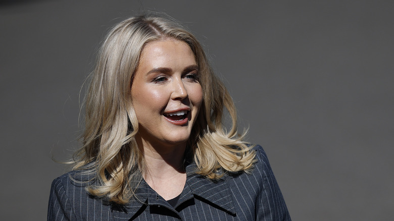 Karoline Leavitt photographed speaking to reports outside the White House on October 16, 2025