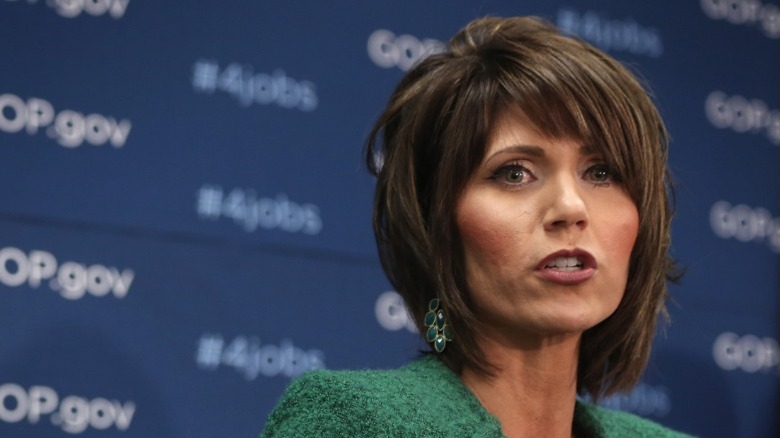 Kristi Noem speaks during a news briefing on Capitol Hill in Washington, DC (2014)