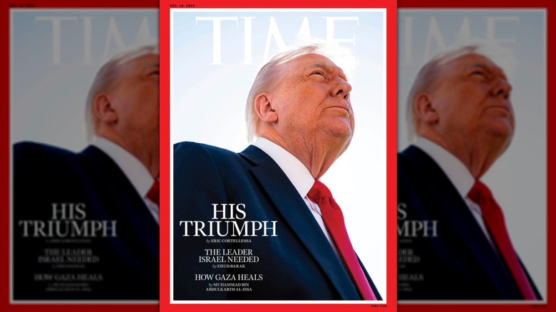 Donald Trump photographed from a low angle for the cover of Time magazine.