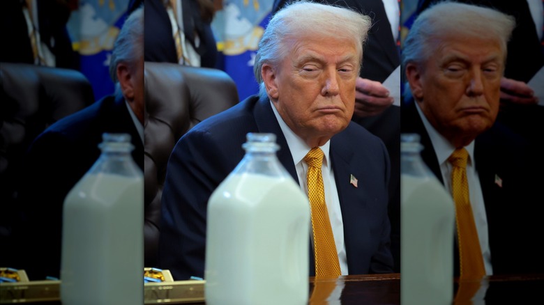 Donald Trump glares at a bottle of milk.