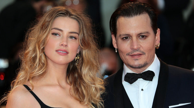 Johnny Depp and Amber Heard posing together
