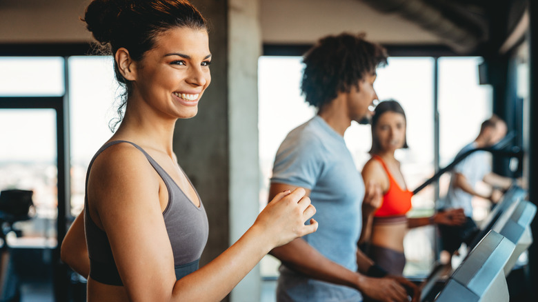 Woman happy to be in the gym