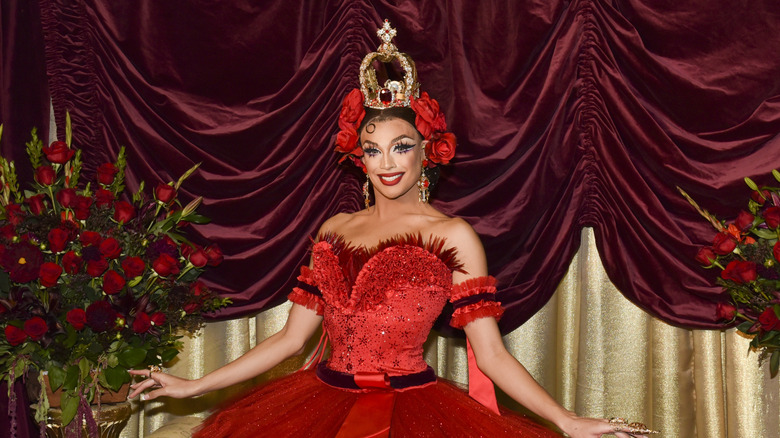 Valentina (former "RuPaul's Drag Race" contestant) posing in a red ensemble in 2017
