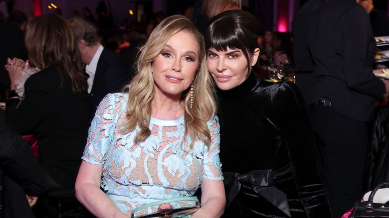 Kathy Hilton and Lisa Rinna (former "Real Housewives "cast members) posing at an event in 2024