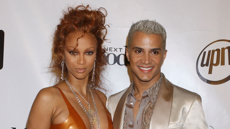 Tyra Banks and Jay Manuel (from "America's Next Top Model") posing at an event