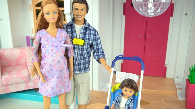 Pregnant Midge Barbie doll with Ken and baby