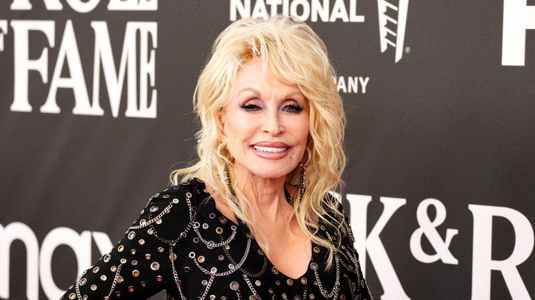 Dolly Parton on the red carpet at the 37th Annual Rock and Roll Hall of Fame Induction Ceremony in 2022