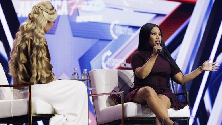 Erika Kirk interviews Nicki Minaj onstage at the AmericaFest conference in Phoenix, AZ (2025)