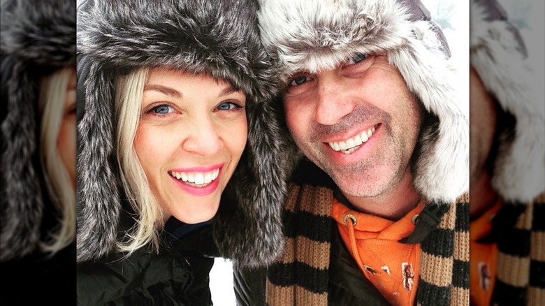 Dave and Kortney Wilson smiling together in a selfie in 2016 wearing winter hats