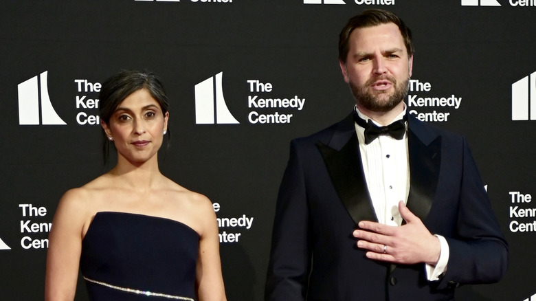 Usha and JD Vance staring at the camera