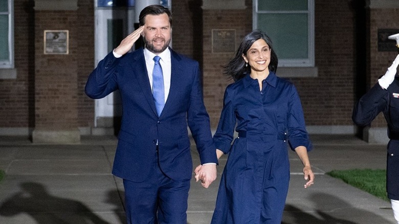 JD Vance saluting while Usha Vance smiles