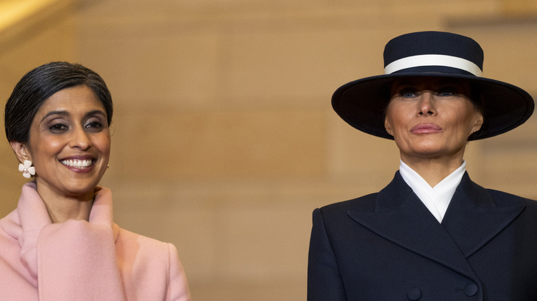Usha Vance smiling next to Melania Trump.