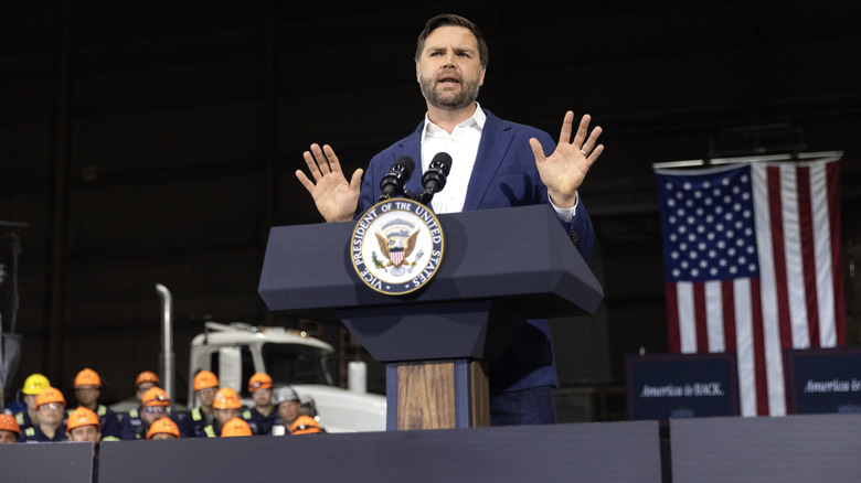 JD Vance speaking at podium
