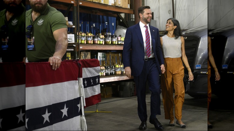 Republican vice presidential nominee, U.S. Sen. J.D. Vance (R-OH) walks on stage with his wife, Usha before speaking at a rally at trucking company, Team Hardinger on August 28, 2024 in Erie, Pennsylvania (2024)