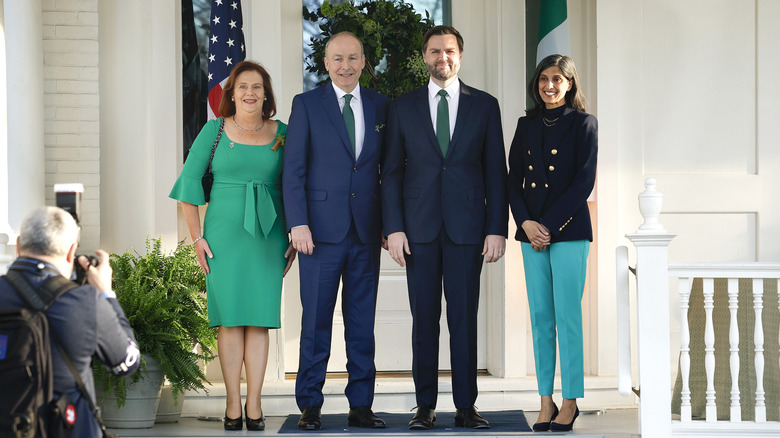 Micheál Martin and Mary O'Shea standing with JD and Usha Vance