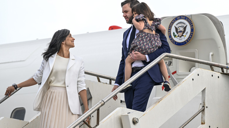 Usha Vance and JD Vance disembark the plane in Italy with their daughter