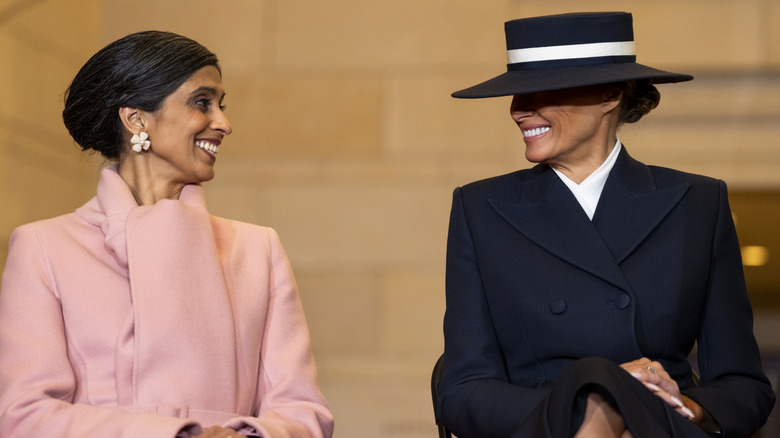 Usha Vance and Melania Trump smile at each other