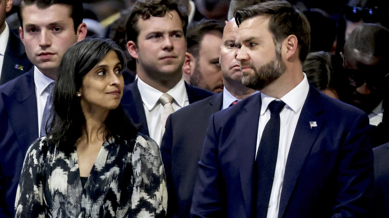 JD and Usha Vance looking at each other during mass at St. Peter's