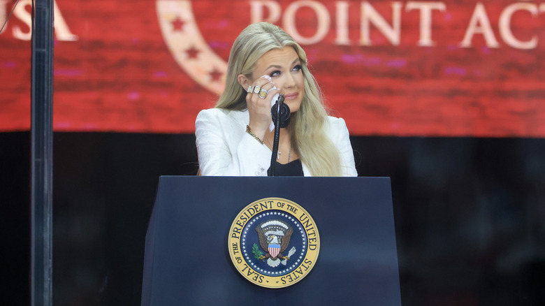 Erika Kirk crying behind the podium at Charlie Kirk's memorial