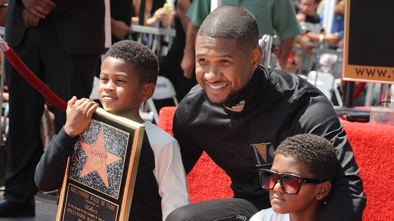 Usher and his two sons