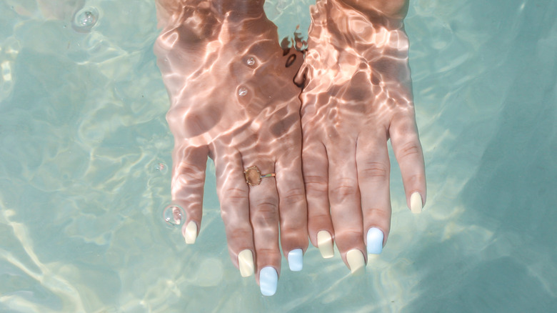 painted nails underwater 