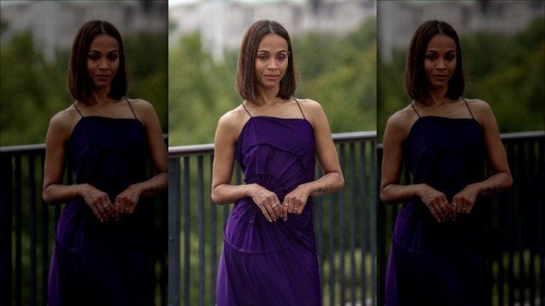 Zoe Saldana wearing purple satin dress