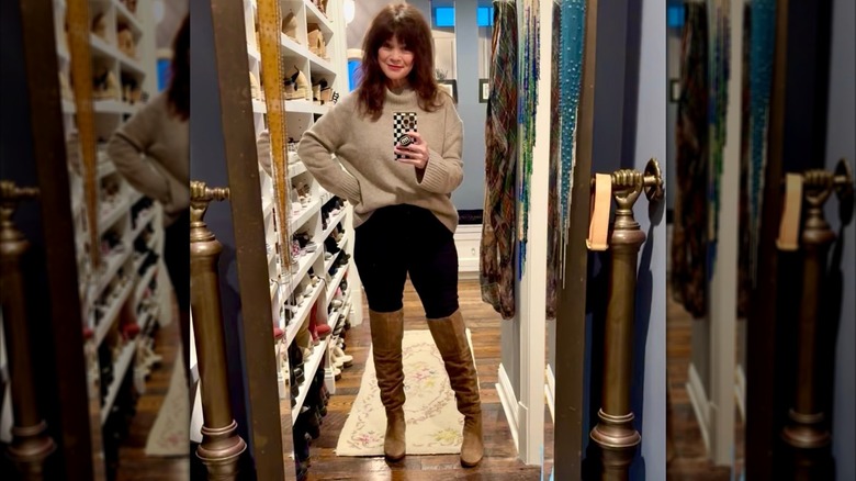 Valerie Bertinelli mirror selfie with knee-high boots