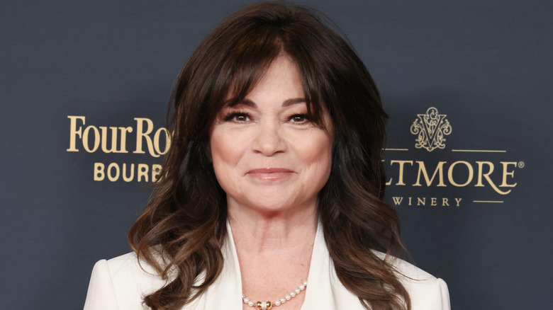Closeup of Valerie Bertinelli smiling in white blazer