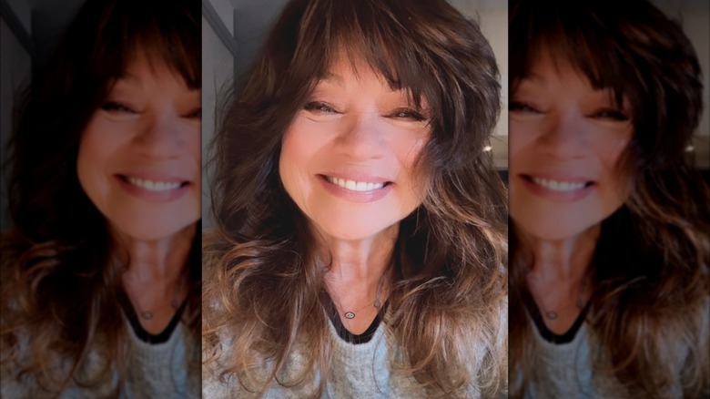 Valerie Bertinelli smiling as a brunette