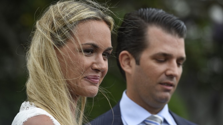 Vanessa Trump and Donald Trump Jr. standing outside in the wind