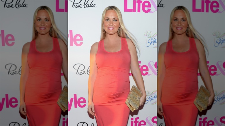 Vanessa Trump on a Life & Style red carpet, clutching one of her handbags