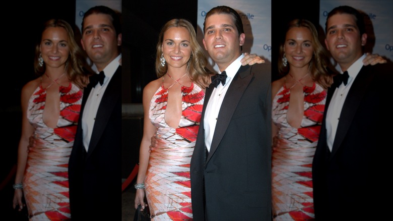Vanessa and Donald Trump Jr. smiling on step-and-repeat